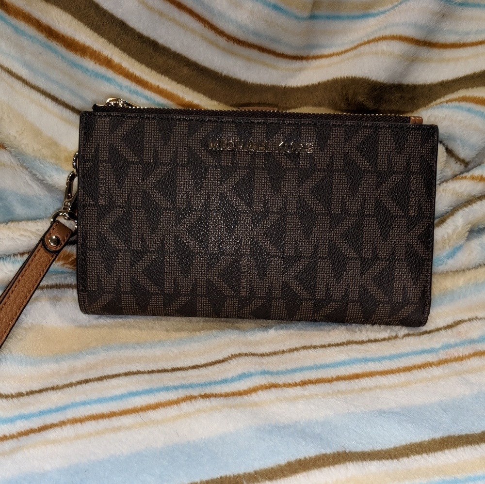 SOLD!!!!!!!!Triple zip Michael Kors wallet